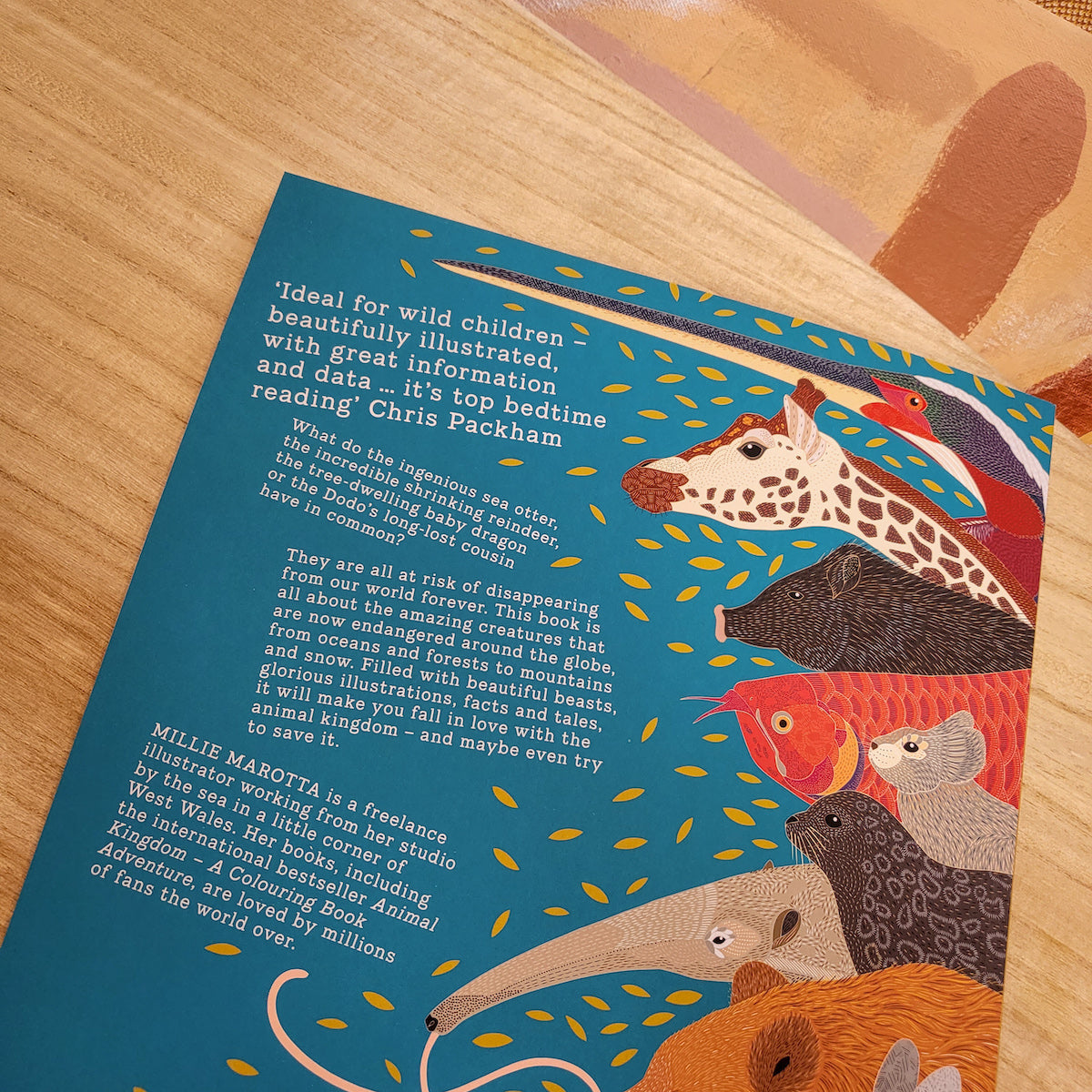 Image of the back cover of a children's book about A Wild Childs Guide to Endangered Animals.