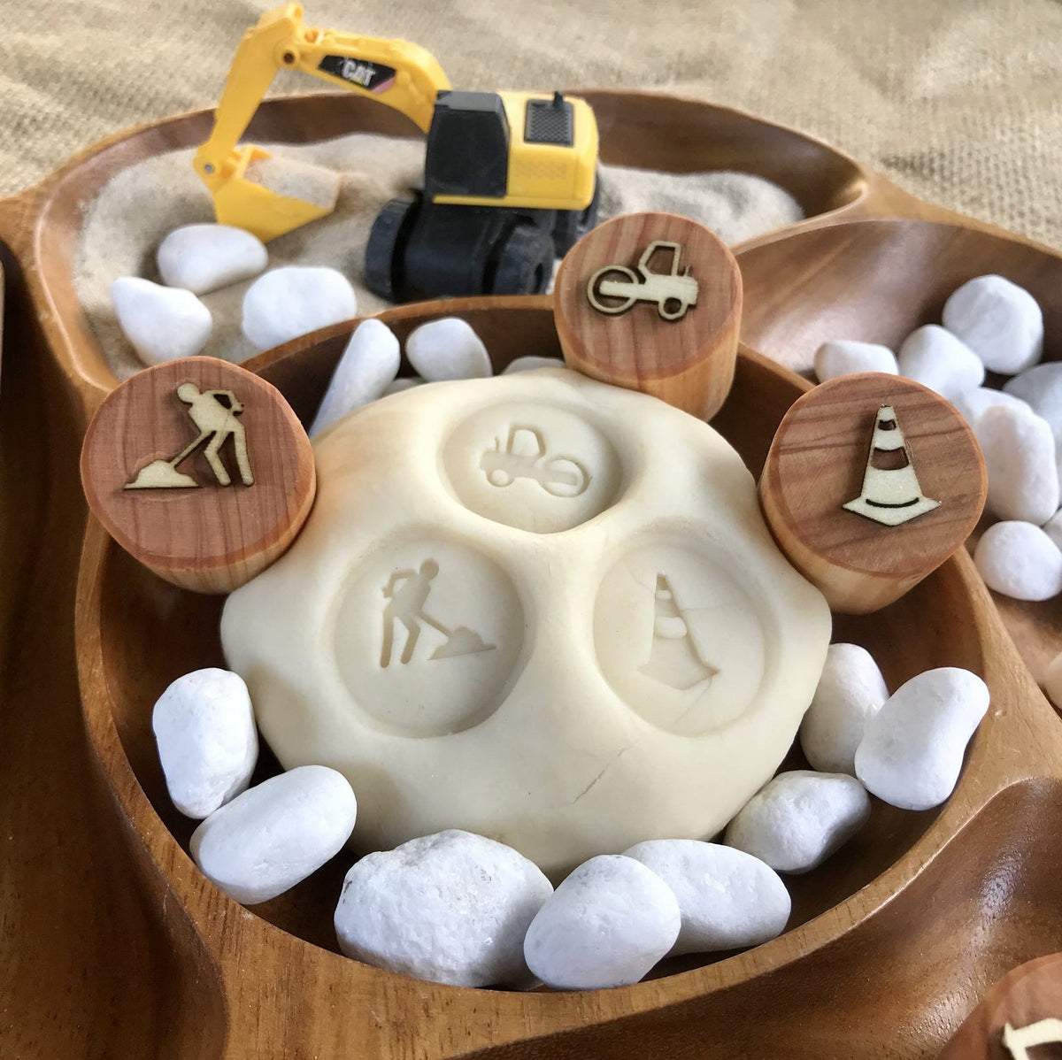 image of construction themed play dough stamps